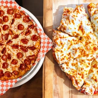 #1 Family Feast - 2 Large 1 Topping Pizza And 2 Liter Soda